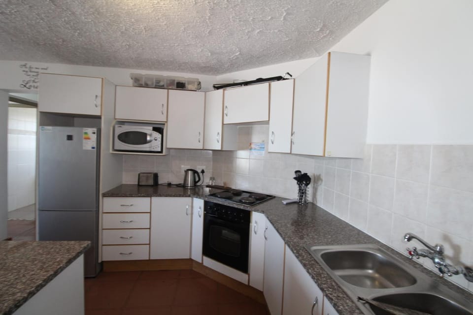 Kitchen or kitchenette, oven, stove