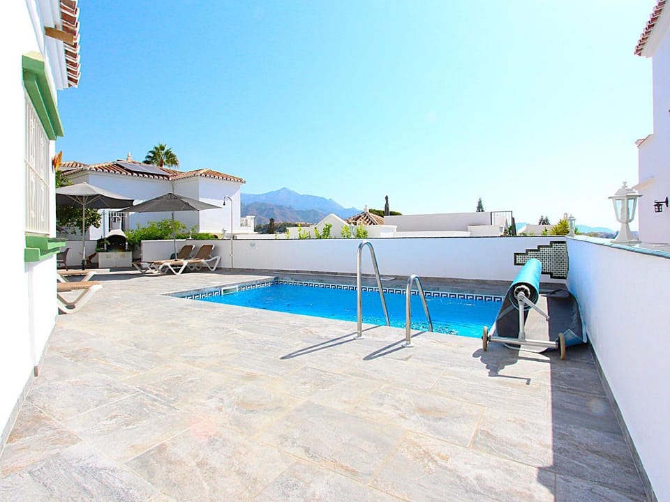 Property building, Living room, Swimming pool