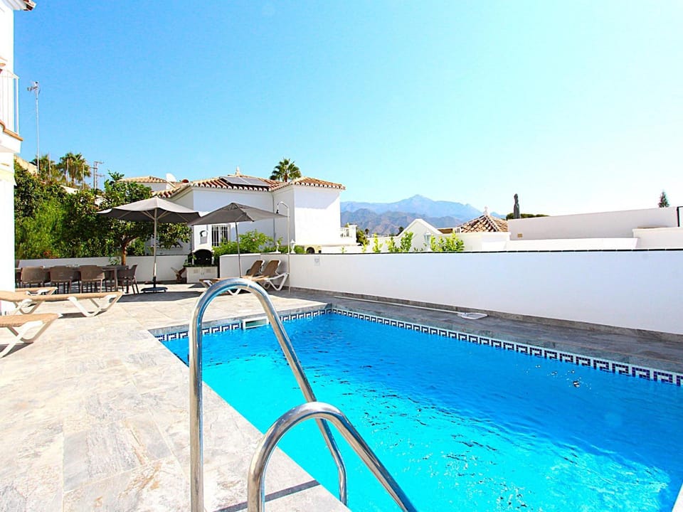Property building, Living room, Swimming pool