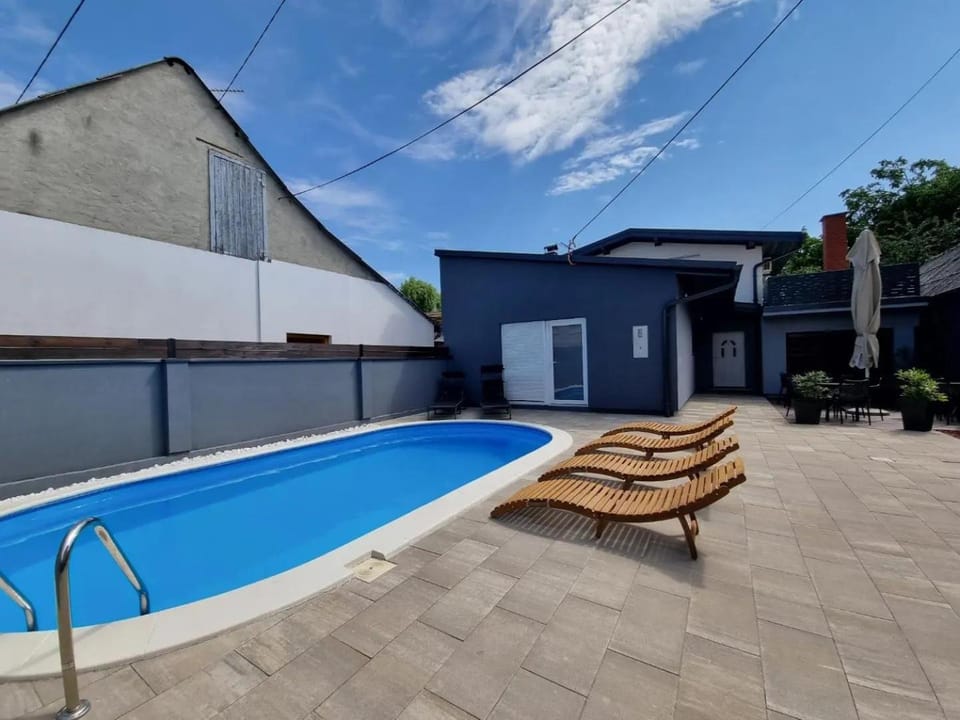 Property building, Patio, Swimming pool, Swimming pool