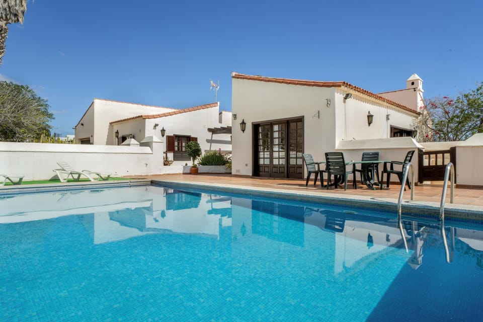 Property building, Living room, Swimming pool