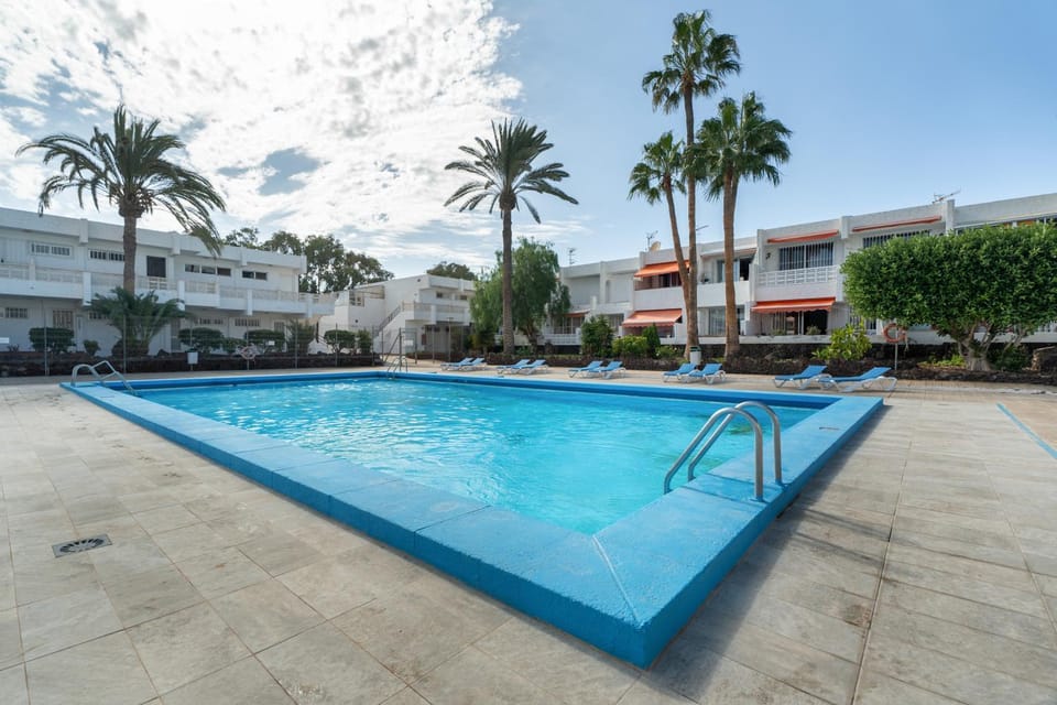 Property building, Living room, Swimming pool