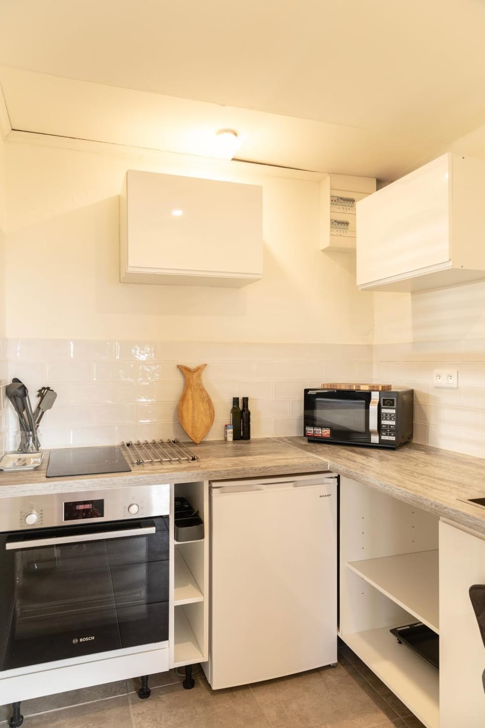 Kitchen or kitchenette, oven, stove