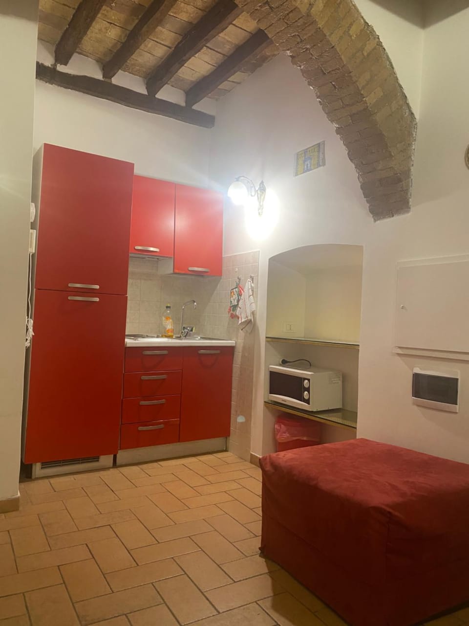 Kitchen or kitchenette, microwave, stove