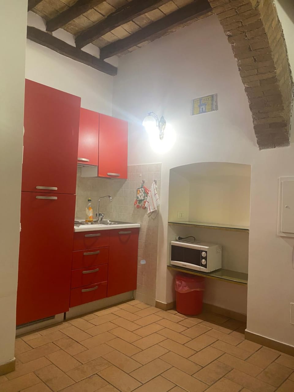 Kitchen or kitchenette, microwave, stove