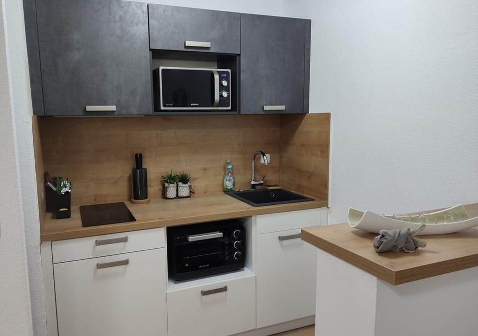 Kitchen or kitchenette, dishwasher, oven, stove, kitchen