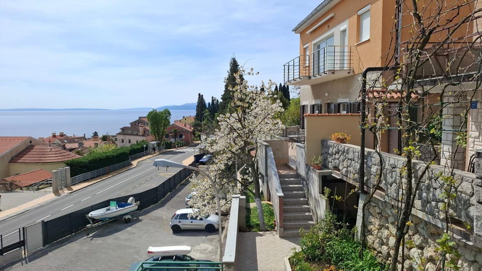 Property building, Natural landscape, Sea view, Street view, Parking