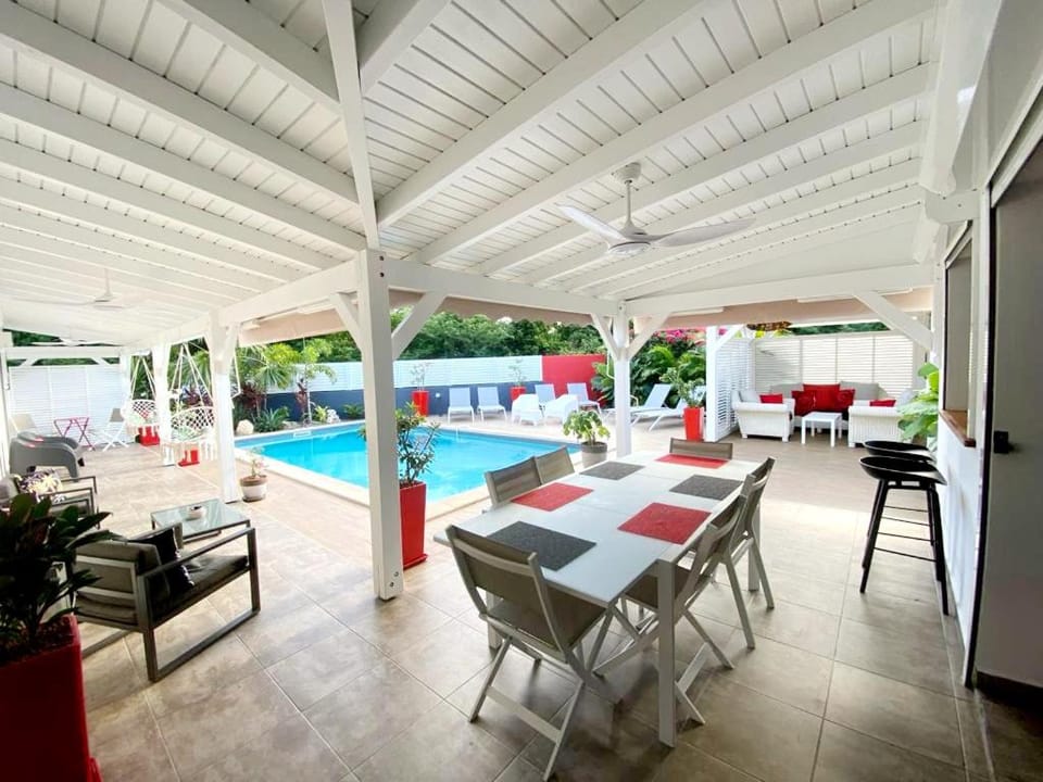 Patio, Living room, Dining area, Pool view, Swimming pool