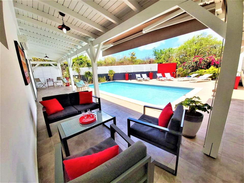 Patio, Living room, Seating area, Dining area, Pool view, Swimming pool, sunbed