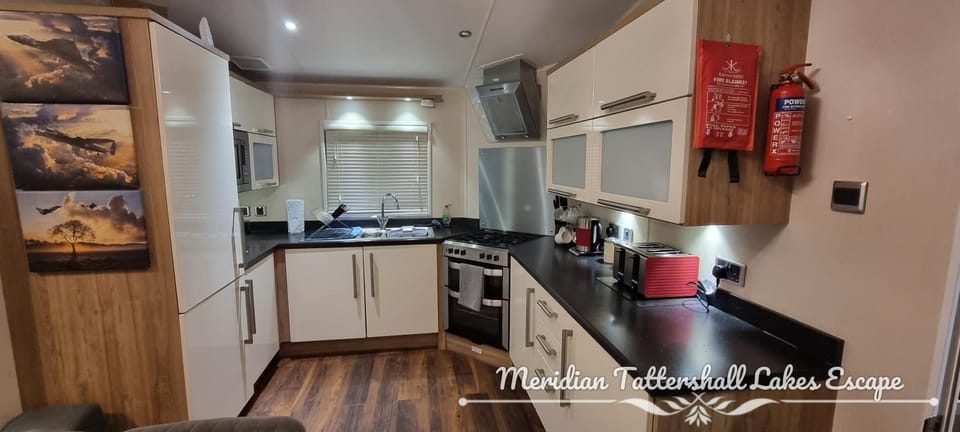 Kitchen or kitchenette, oven, stove, toaster