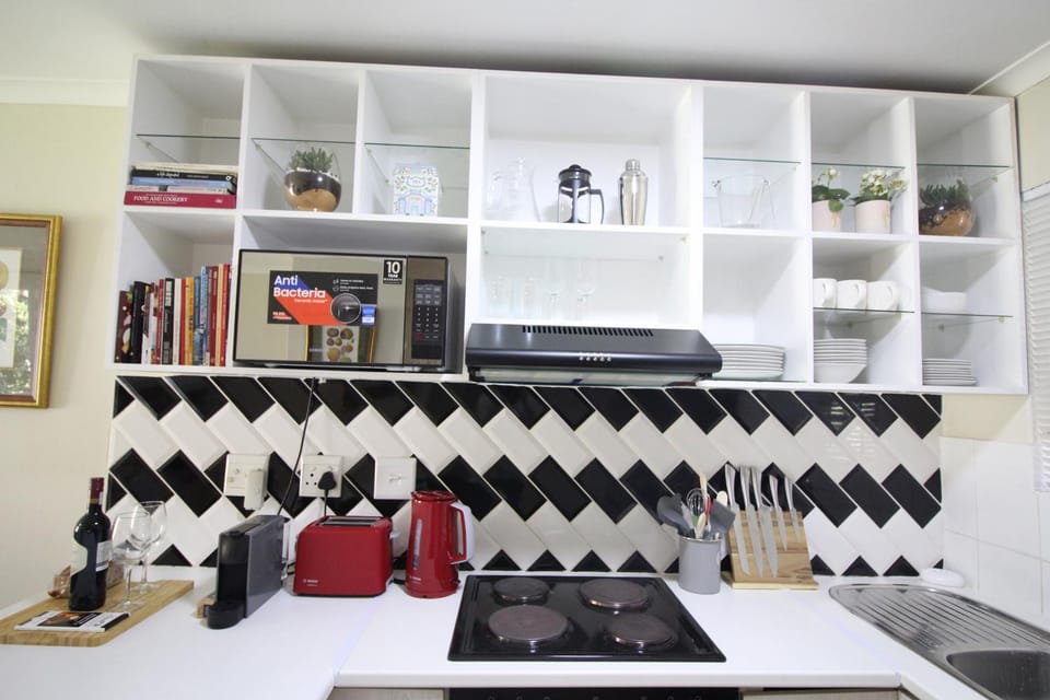 Kitchen or kitchenette, stove, toaster