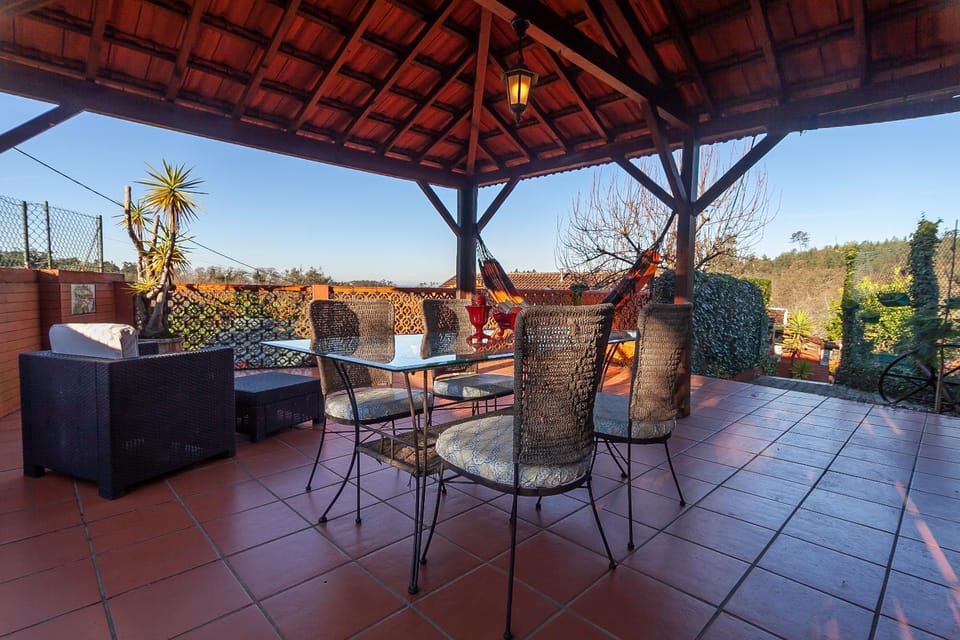 Property building, Patio, View (from property/room), Living room, Dining area