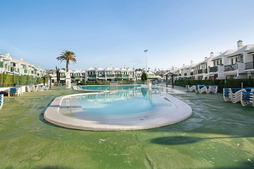 Property building, Living room, Swimming pool