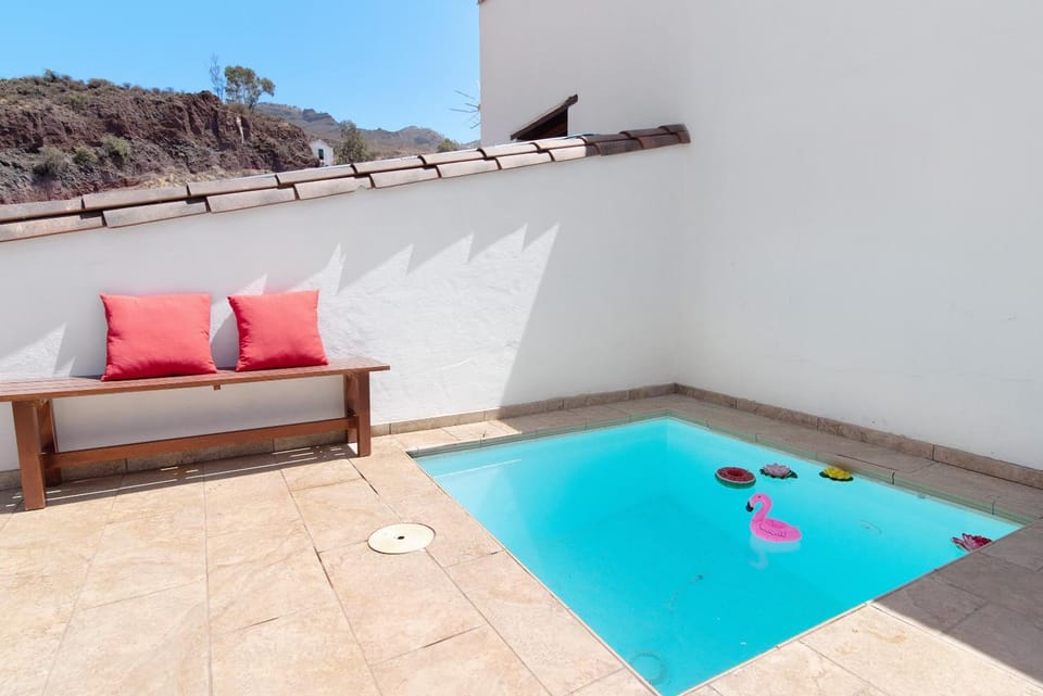 Property building, Living room, Swimming pool