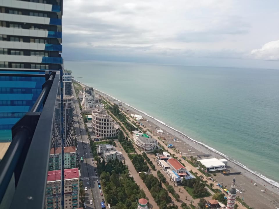 Property building, Natural landscape, Bird's eye view, Beach, City view, Sea view, Location