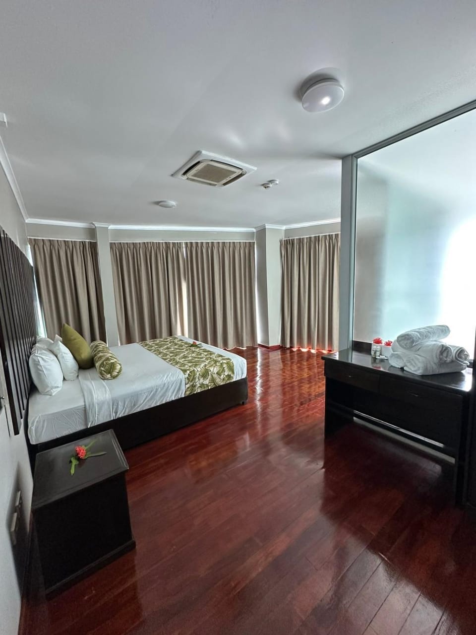 Photo of the whole room, Bedroom, towels, air conditioner