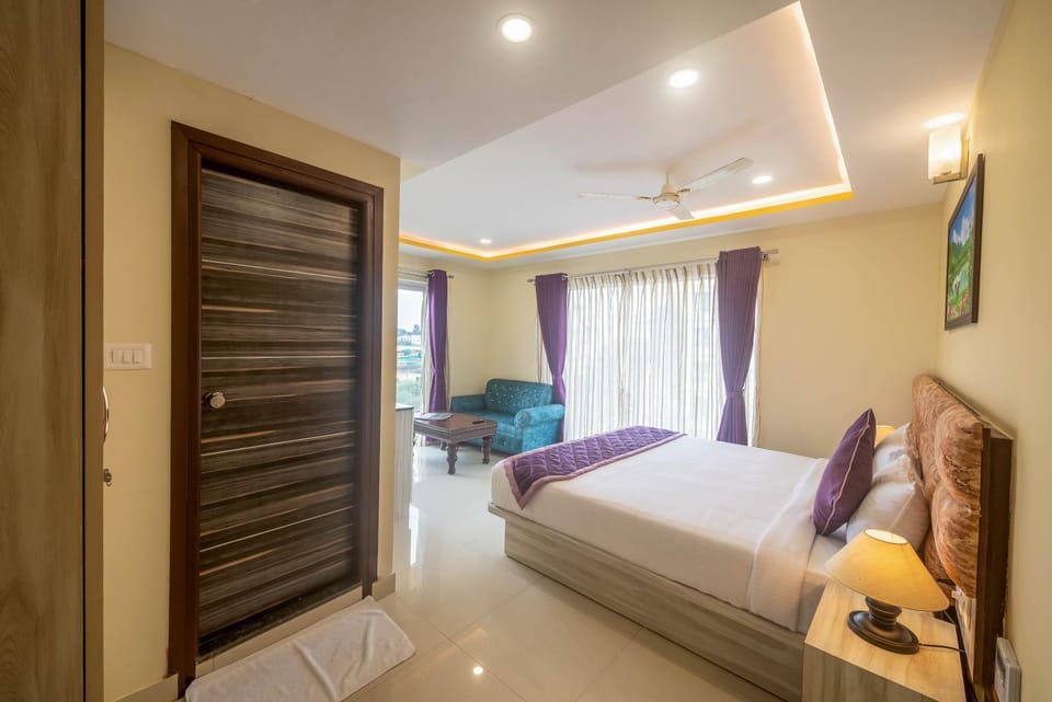 Bed, Living room, Seating area, Bedroom