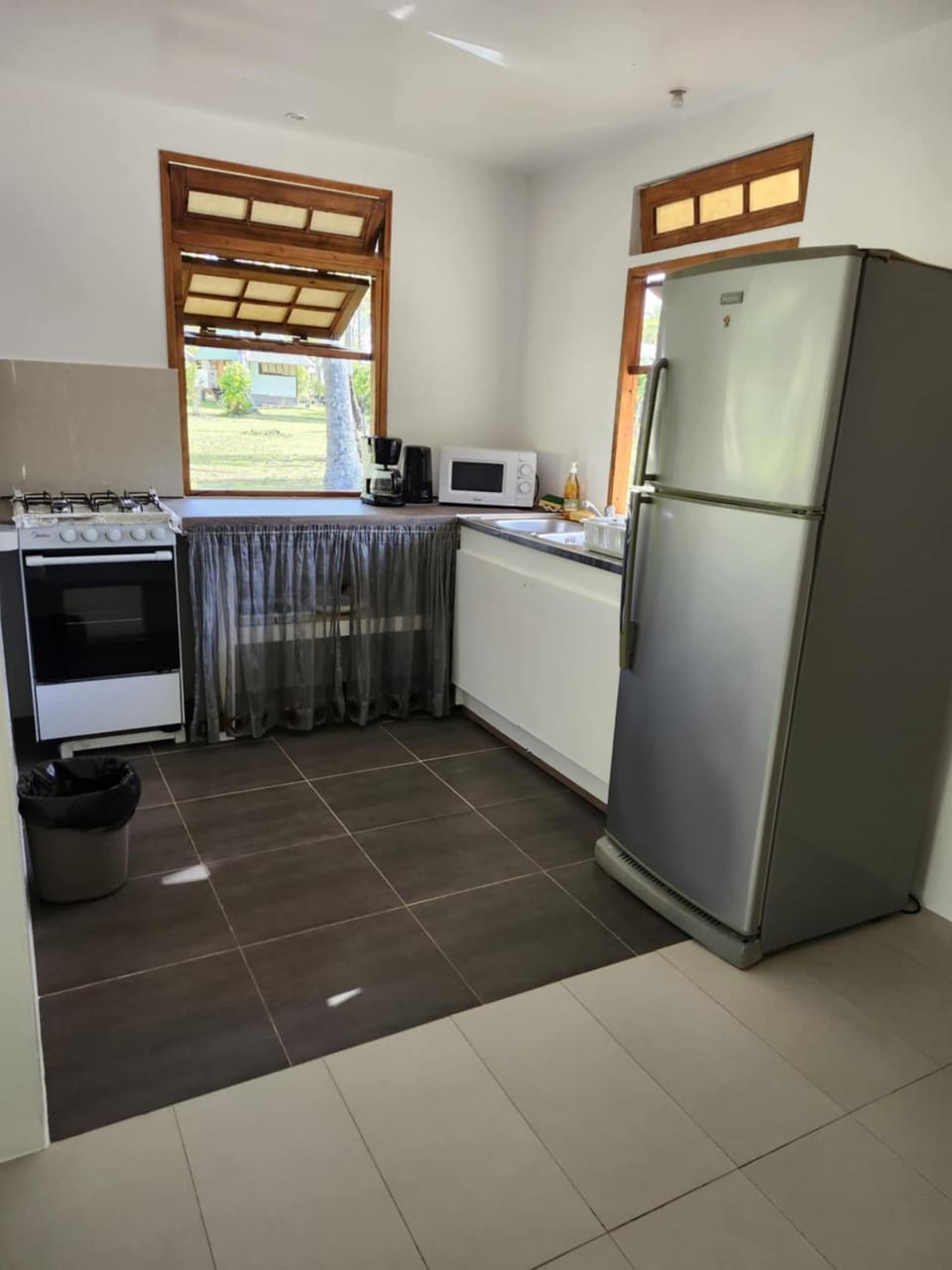 Kitchen or kitchenette, oven, stove