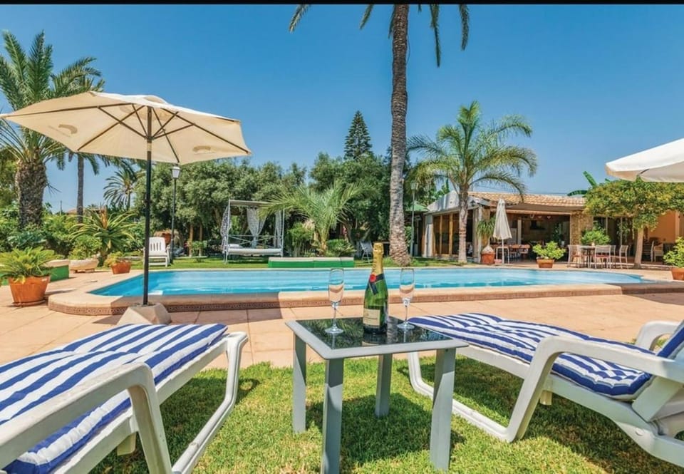 Property building, Living room, Swimming pool