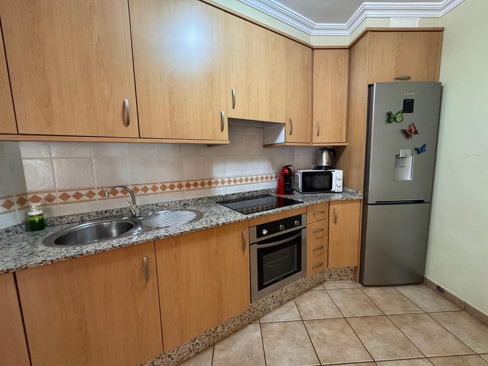 Kitchen or kitchenette, oven, stove