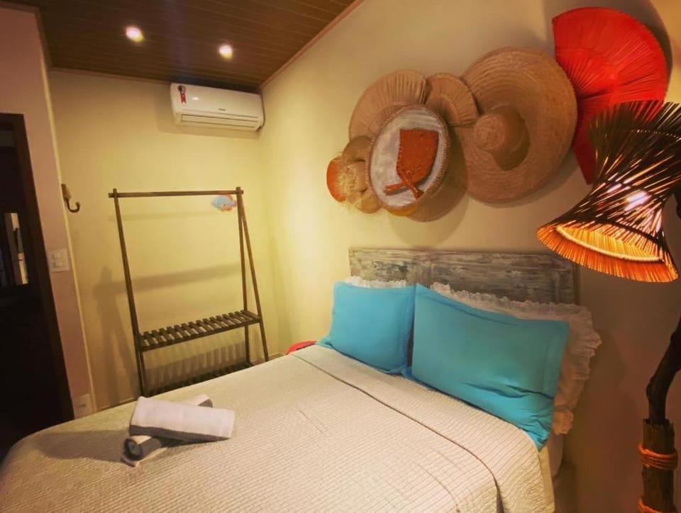 Bed, Photo of the whole room, Bedroom, towels, air conditioner