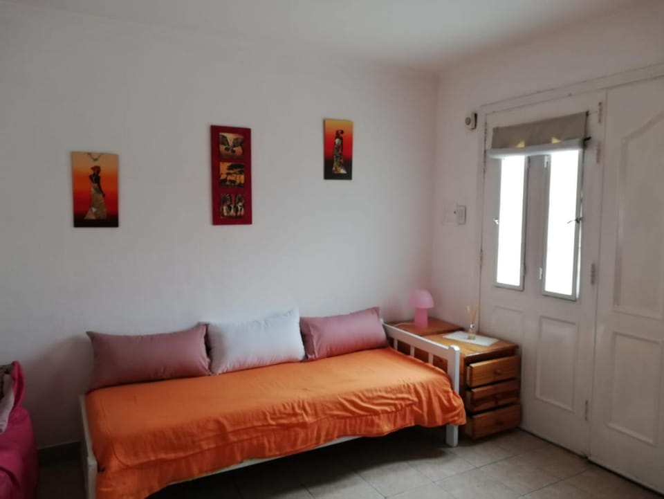 Bed, Seating area, Bedroom