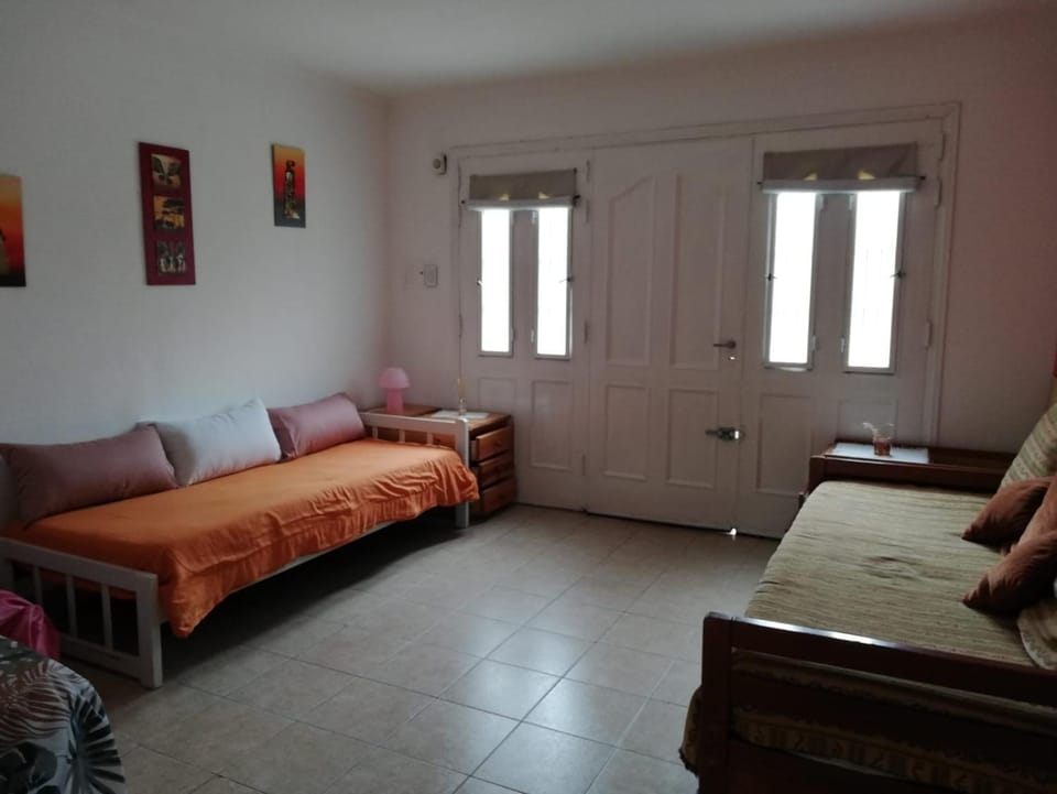 Bed, Living room, Seating area, Bedroom
