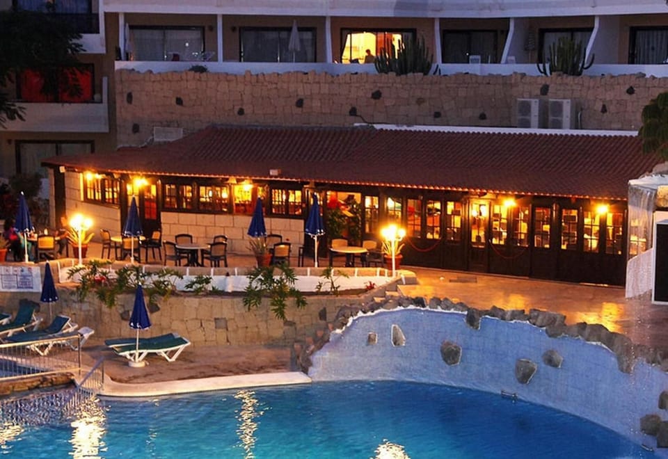 Property building, Living room, Swimming pool