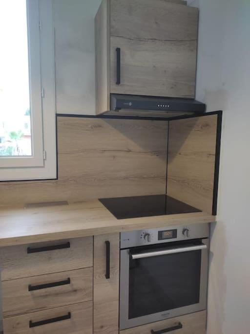 Kitchen or kitchenette, stove