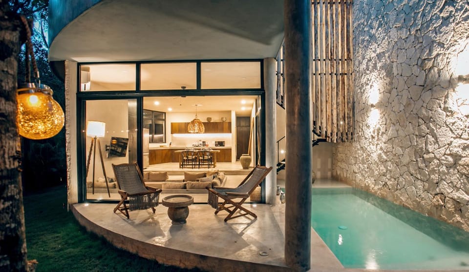 Patio, Night, Living room, Seating area, Pool view, Swimming pool, Swimming pool