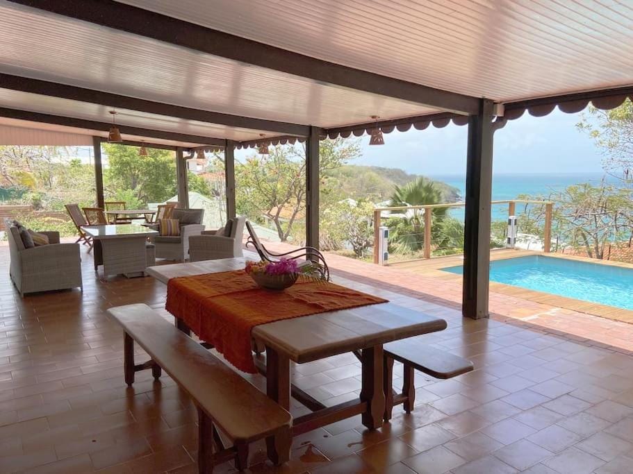 Patio, Natural landscape, View (from property/room), Seating area, Dining area, Sea view, Swimming pool