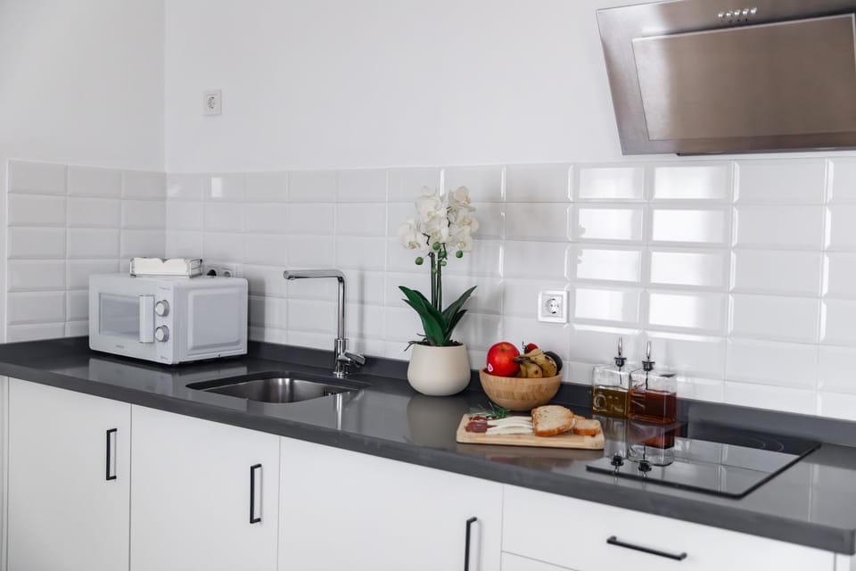 Kitchen or kitchenette, stove, toaster