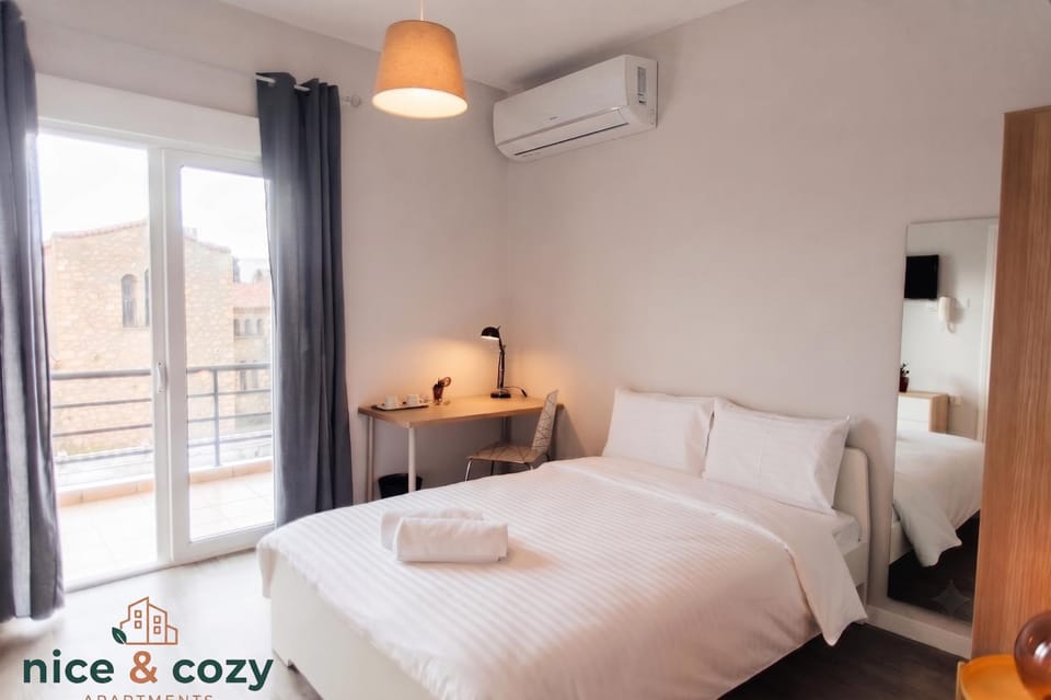 Bed, Photo of the whole room, Bedroom, towels, air conditioner