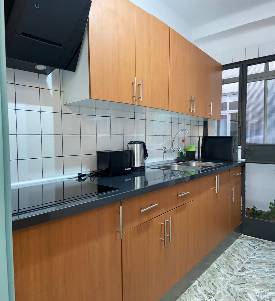 Kitchen or kitchenette, stove, toaster