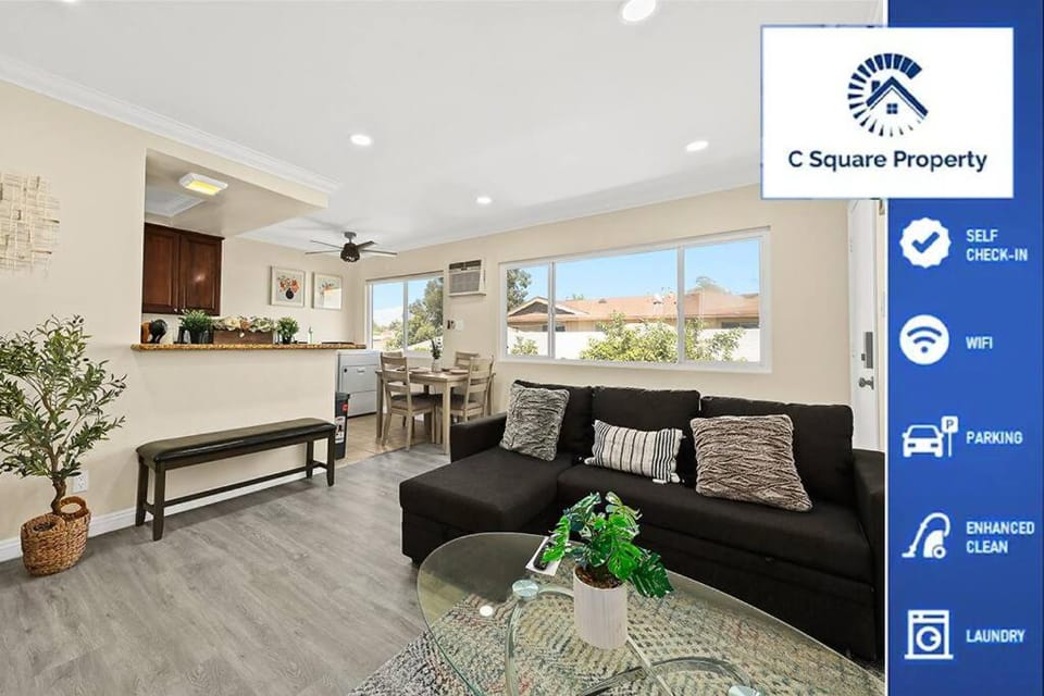 Property logo or sign, Living room, Seating area, Dining area, Logo/Certificate/Sign, Text overlay, Certificate/Award