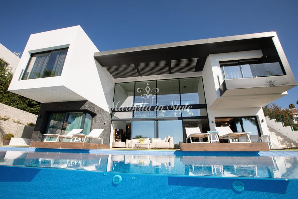 Property building, Patio, Pool view, Swimming pool, sunbed