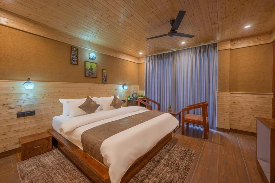 Wooden Rooms With Pvt Balcony l Conference Hall l Scenic Venues for Private Parties l Basic First Aid l Spacious Car Parking l Managed By Exotic Stays Group Hotel in Himachal Pradesh