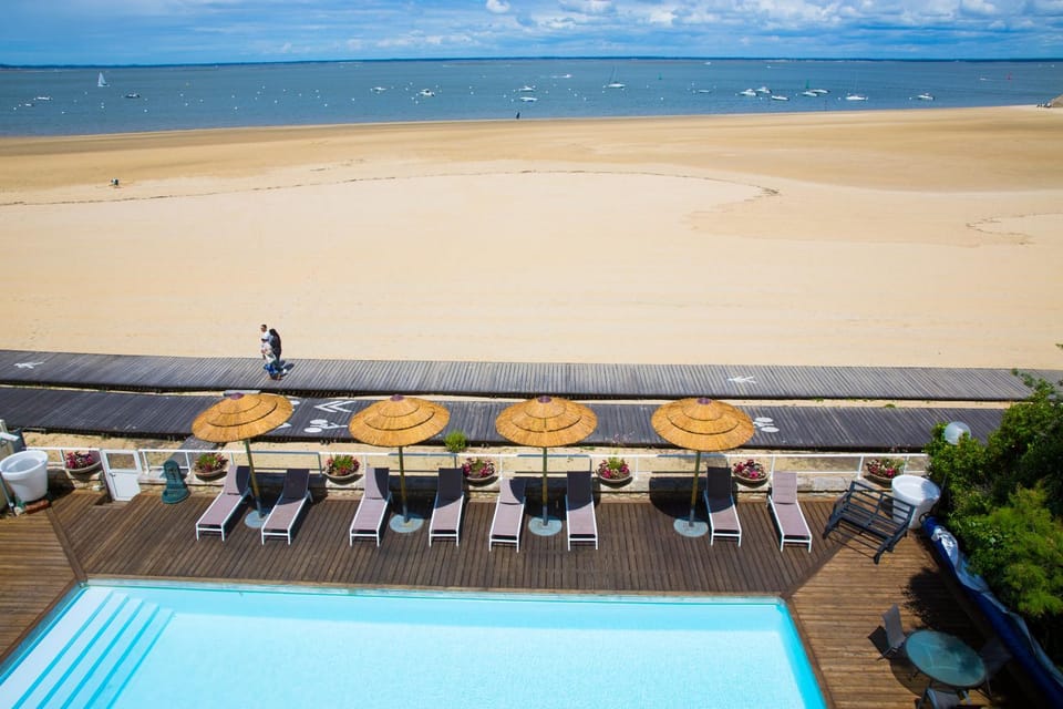 View (from property/room), Beach, Sea view, Swimming pool, sunbed