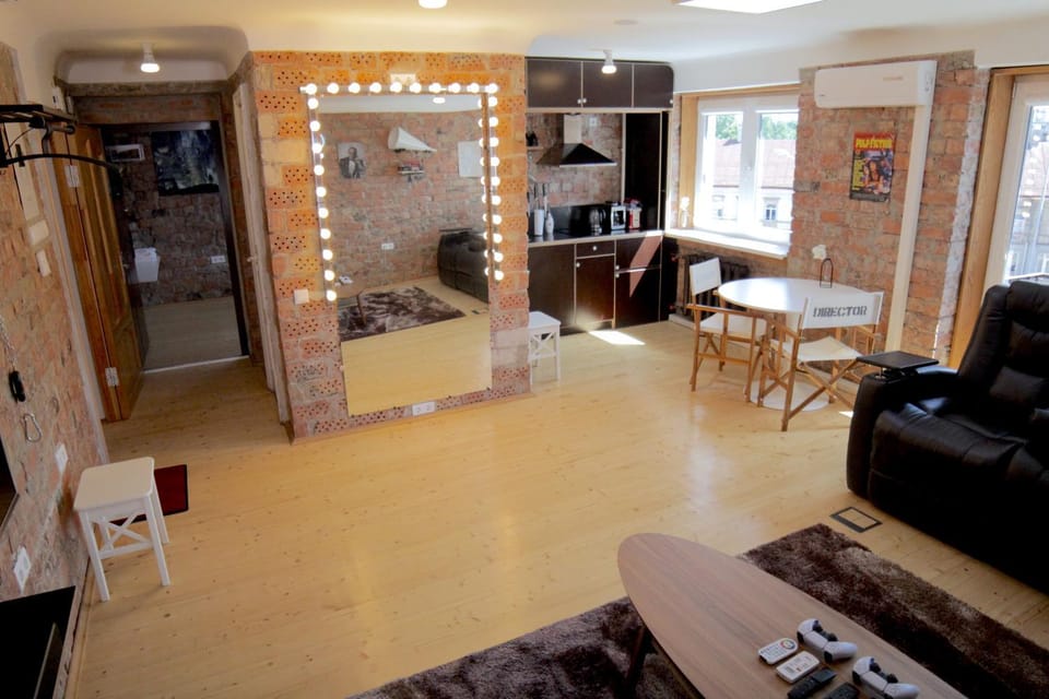 Kitchen or kitchenette, Living room, Photo of the whole room, Seating area, Dining area, stove, kitchen, air conditioner