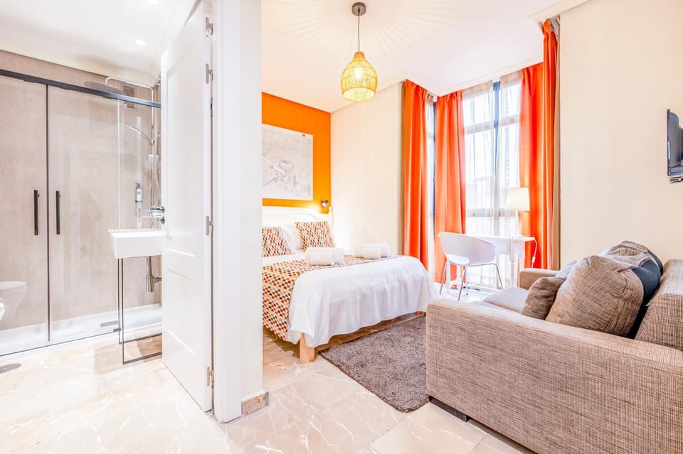 Bed, Living room, Photo of the whole room, Seating area, Bedroom, towels, wardrobe