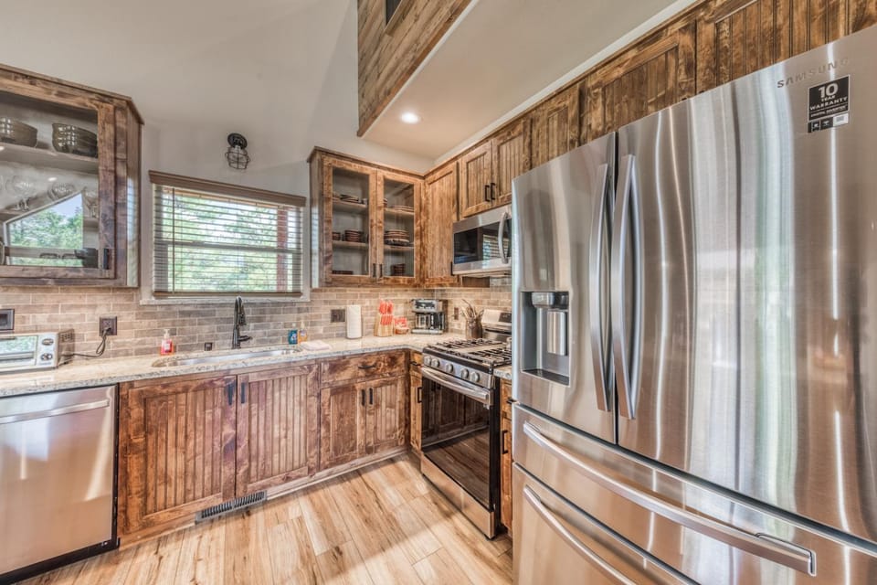 Kitchen or kitchenette, microwave, oven, stove, kitchen