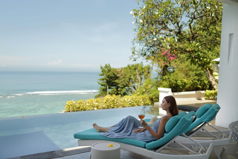 Property building, Day, People, Natural landscape, View (from property/room), Seating area, Beach, Pool view, Sea view, Swimming pool, sunbed
