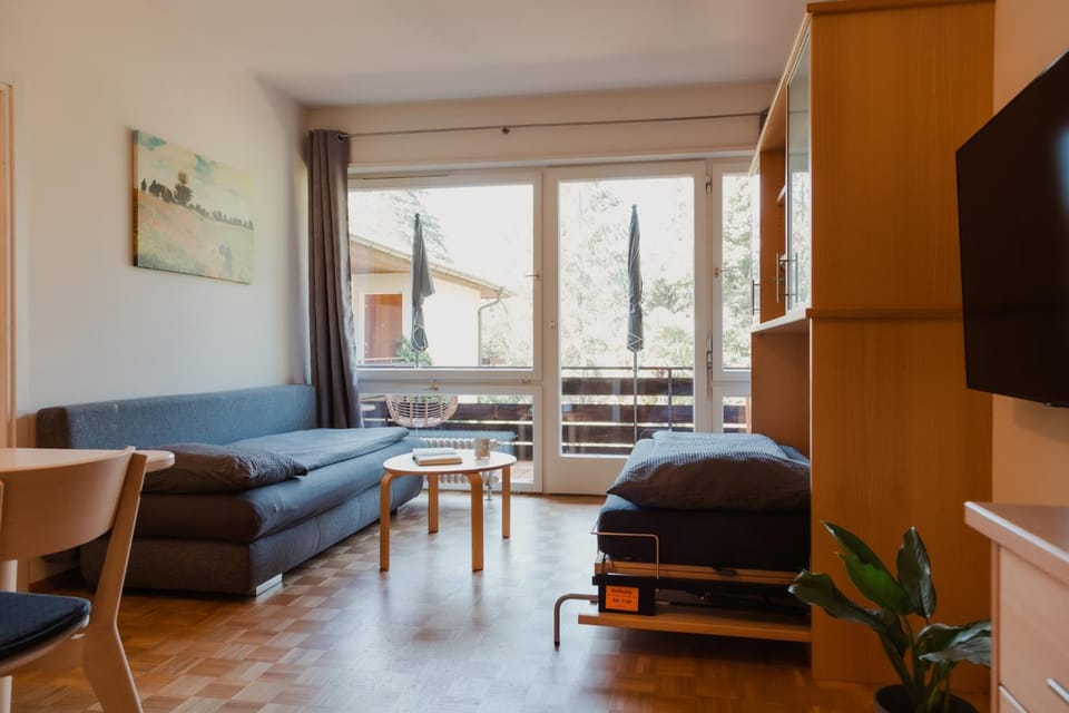 Bed, Living room, Seating area