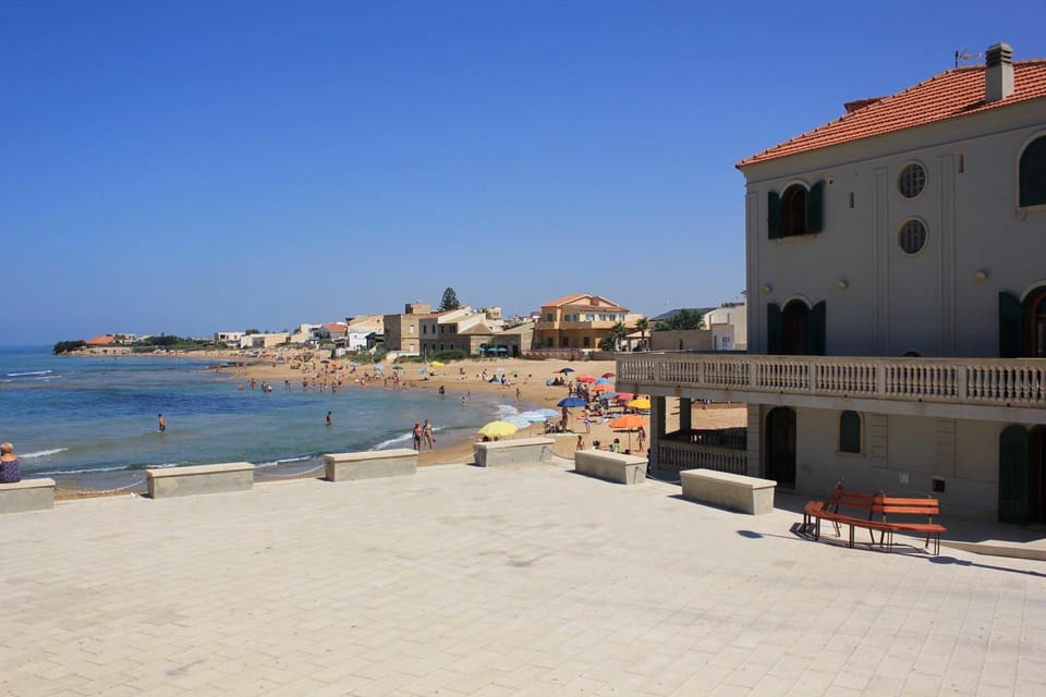 Property building, Nearby landmark, Beach