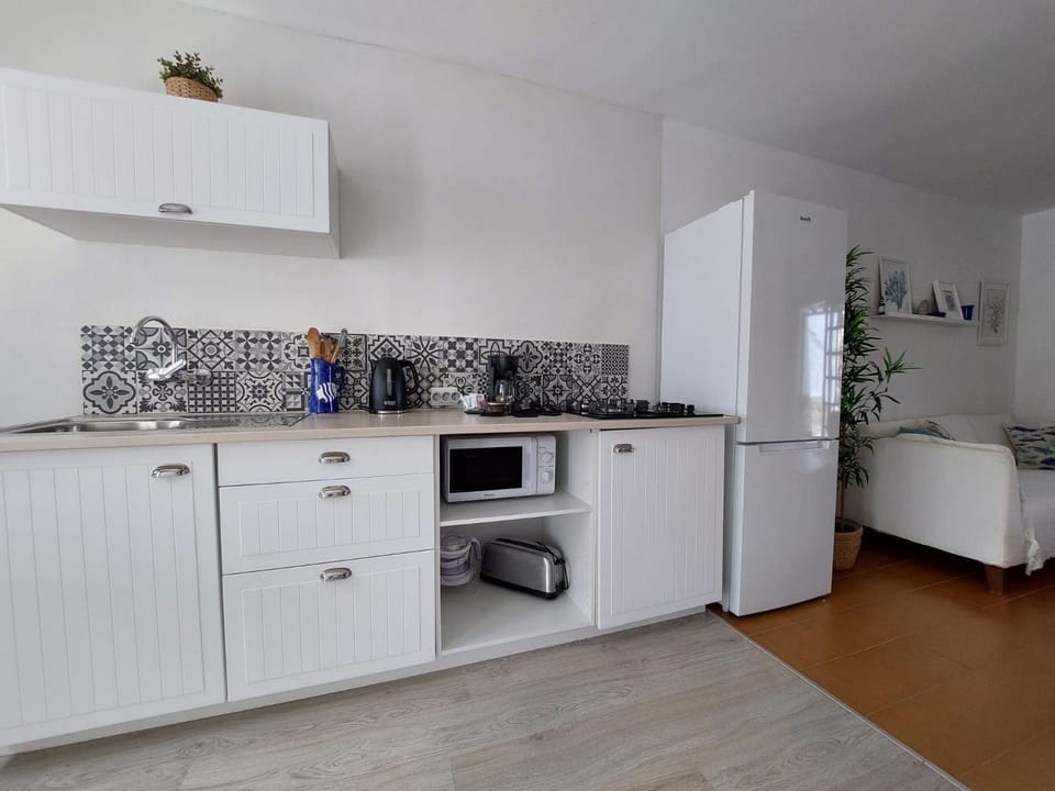 Kitchen or kitchenette, microwave