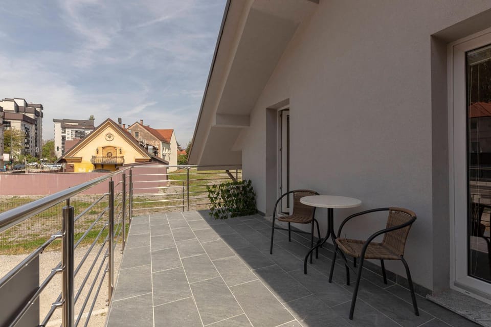 Property building, Patio, Day, View (from property/room), Balcony/Terrace