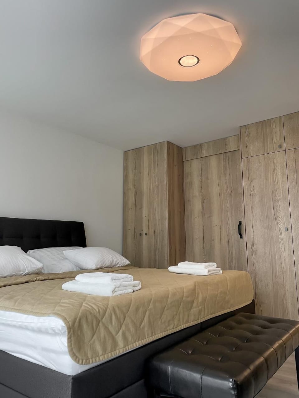 Photo of the whole room, Bedroom, towels, wardrobe