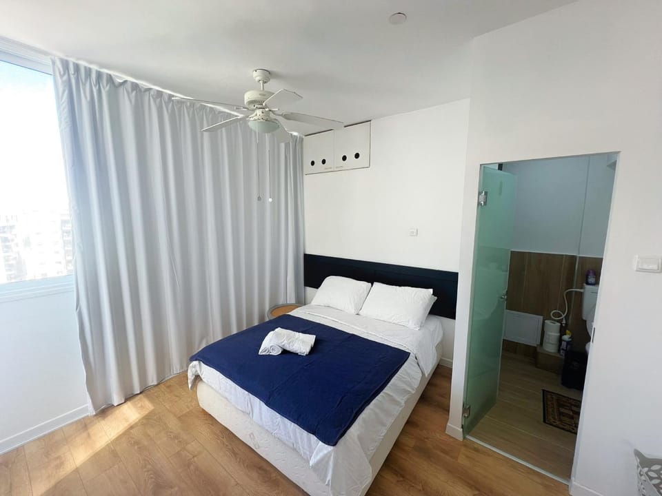 Bed, Photo of the whole room, Bedroom, fireplace, towels