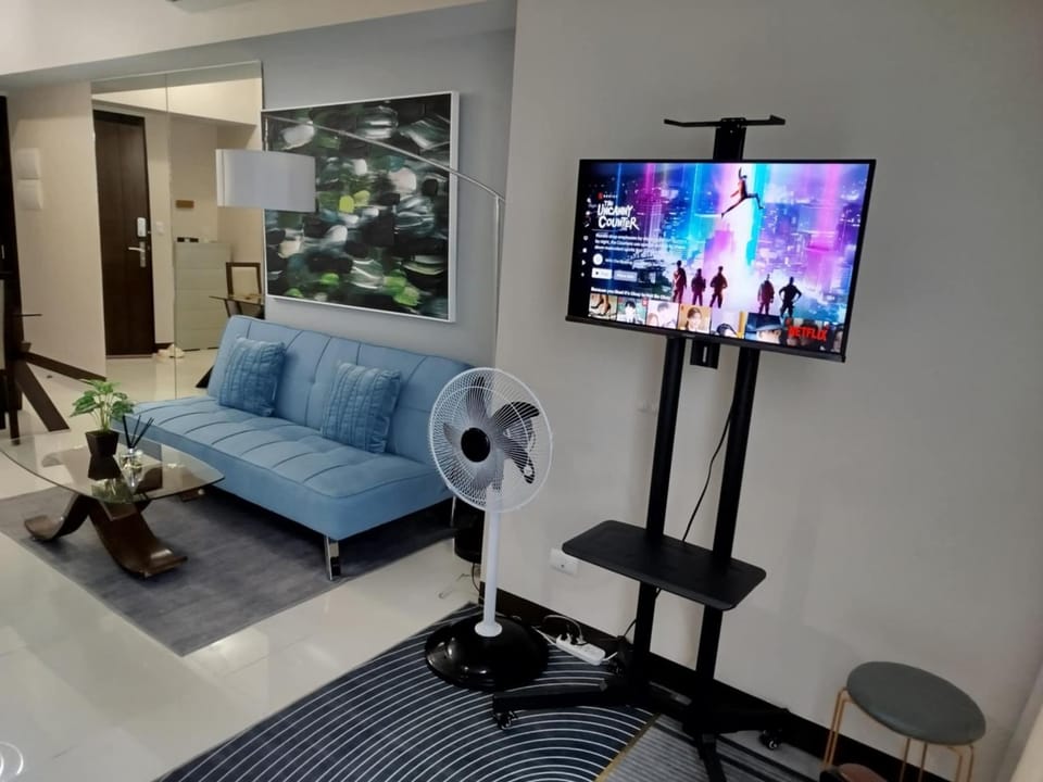 Cozy 1BR UPTOWN PARKSUITES Tower1 BGC Apartment in Makati