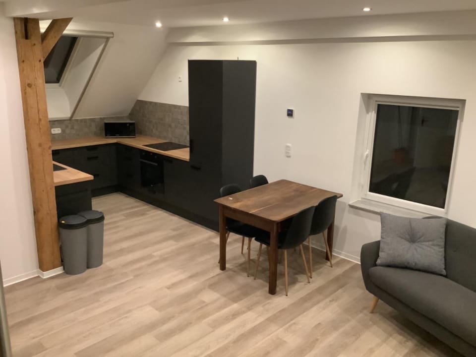 Kitchen or kitchenette, Living room, Seating area, Dining area